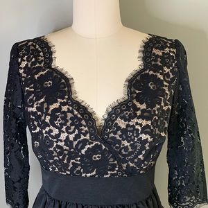 NWT Black dress with lace at bodice & sleeves. Fully lined. No lining at sleeves
